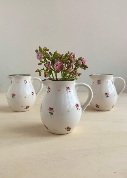 Dalia Floral Milk Jug used as table decor – handpainted Portuguese ceramic jug with pink and green floral design.
